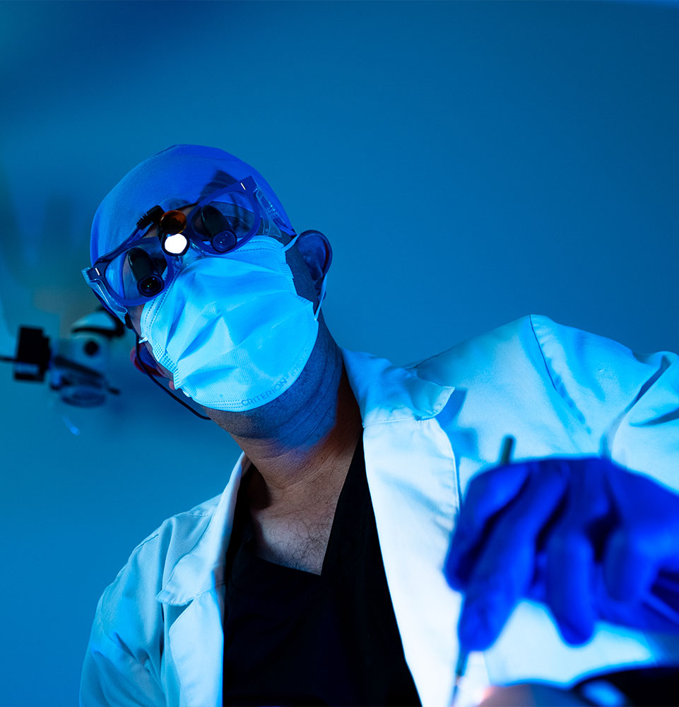 close up of doctor performing dental procedure on patient