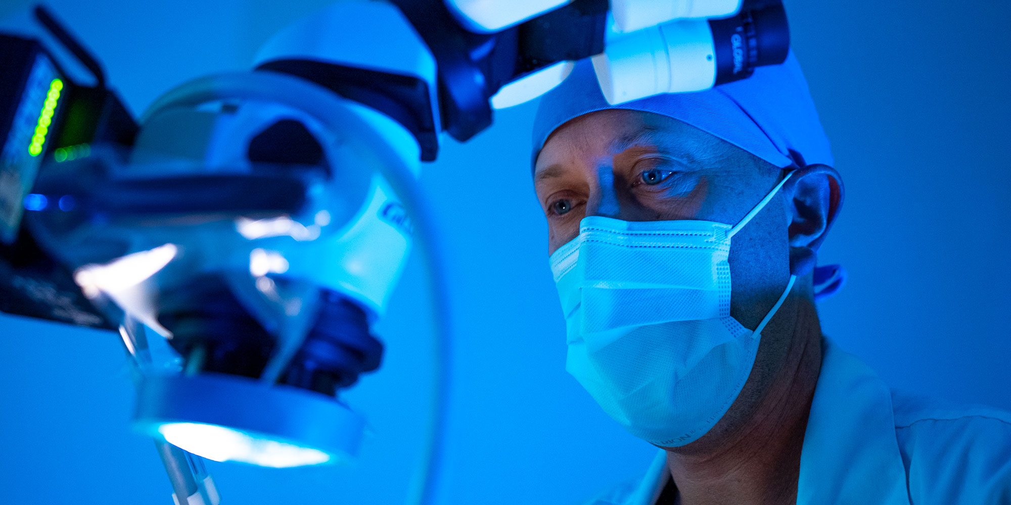 doctor perfomriing dental procedure on dental patient within the dental center